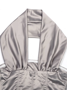 Detail of silver satin halter top showing pleated fabric and non-slip silicone edge