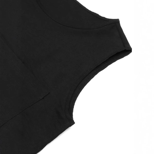 Detail view of the double-stitched shoulder seams and neckline on a black cotton vest