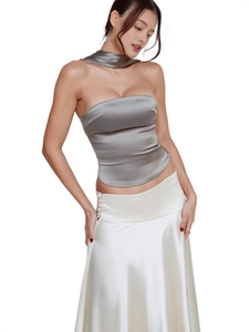 Elegant silver satin tube top paired with a chic cream midi skirt and matching neck scarf