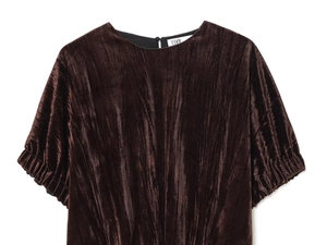 Detail of dark brown velvet texture and puff sleeve gathering on this stylish top