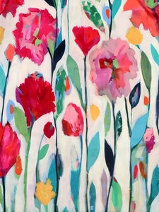 Close-up of vibrant floral print fabric with artistic oil painting strokes and texture