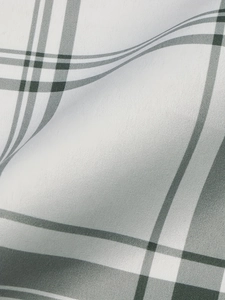High-waist plaid shorts featuring grey and white checkered fabric with textured weave