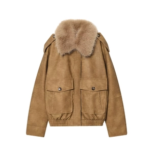 Close-up of camel short jacket featuring faux fur collar and large flap pockets