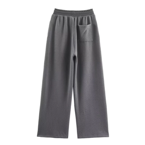Macro view of dark grey rib-knit wide leg pants with elastic waist and back square pocket