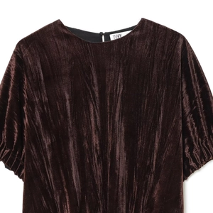 Dark brown velvet balloon sleeve top with back button closure and pleated texture