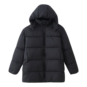 Close-up of black oversized puffer coat with horizontal quilting and hooded design