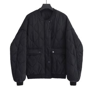 Black onion quilted jacket for women featuring snap closure and large utility pockets