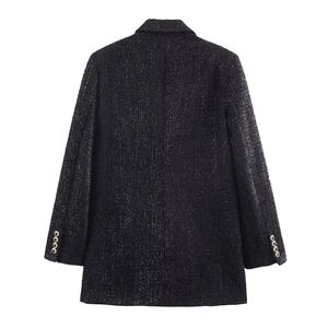 Rear view of black tweed blazer with metallic threads and gold buttons on cuffs