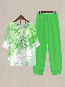 Detail view of the floral print short sleeve top and elastic waist trousers set