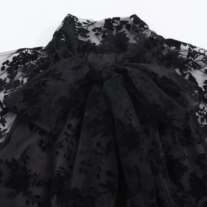 Elegant black lace long sleeve dress with high neck bow and floral flocking texture