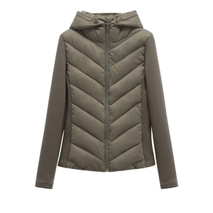 Detail of hooded quilted jacket with olive green V-stitching and knit sleeve contrast