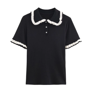 Short sleeve black knit polo shirt with contrast ruffle trim and crystal buttons