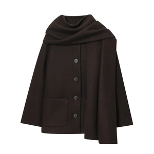 Detail of dark coffee wool coat with scarf collar and textured fabric finish