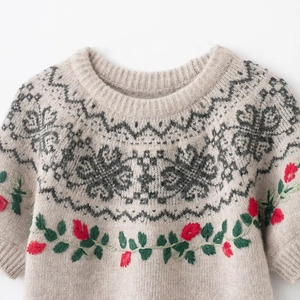 Women's round neck knit sweater with vintage jacquard pattern and floral embroidery accents
