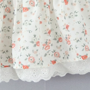 Short sleeve mini floral dress with delicate lace patchwork hem and bohemian print
