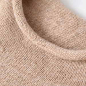 Chic beige short sleeve knit sweater featuring a classic round neck and premium soft texture