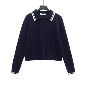 Navy blue knitted long sleeve polo sweater with contrast white stripes and turn-down collar