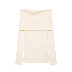 Detail of off-white off-shoulder knit top featuring premium vertical ribbed texture