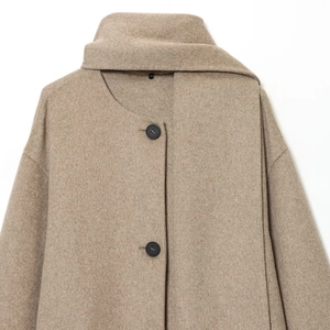 Women's minimalist beige cashmere coat with scarf collar and black round buttons