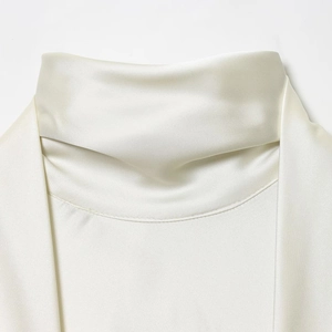 Champagne satin short dress featuring a high stand collar and silky draped texture