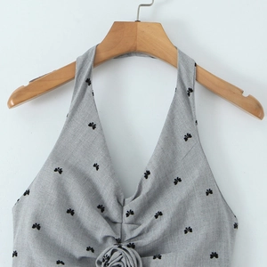 French vintage halter top with 3D floral accent and all-over flocking bow patterns