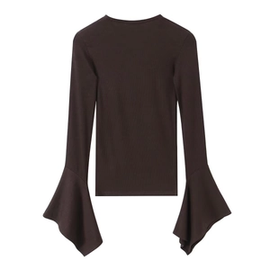 Detail of dark brown ribbed knit long sleeve top featuring dramatic flared bell cuffs