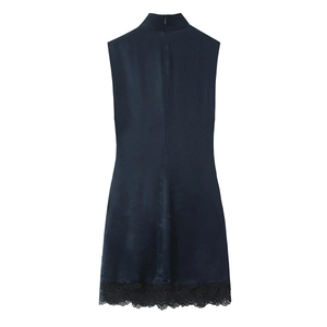 Detail of the high-quality dark teal satin dress with delicate black lace hem stitching