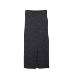 Detail of grey diamond-pattern knit midi skirt with stylish back slit and soft texture