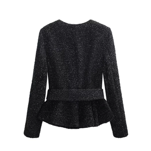 Rear view of black tweed peplum jacket featuring woven texture and round neck detail