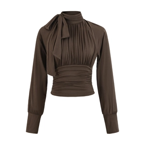 Detail of elegant chocolate brown long sleeve top featuring a large bow and ruched texture