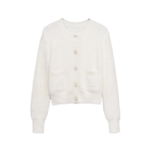 Close-up of cream knit cardigan featuring textured silver buttons and plush faux mink fabric