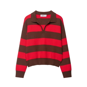 Detail of red and brown striped knit polo sweater with V-neck collar and ribbed cuffs