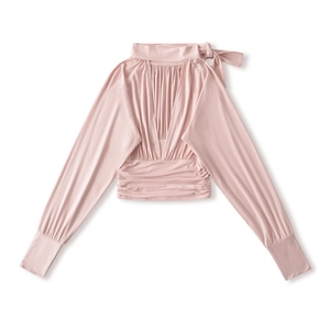 Detail of light pink long sleeve blouse with elegant bow neckline and pleated V-neck