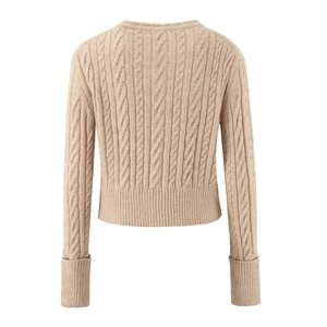 Detail view of the back of a beige cable knit cardigan with ribbed hem and cuffs