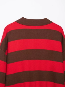 Detailed view of red and brown striped knit polo collar with drop shoulder seams