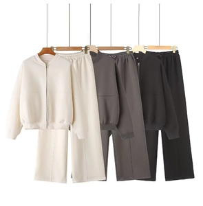 Detailed comparison of zip-up bomber jacket and wide-leg jogger set in three colors