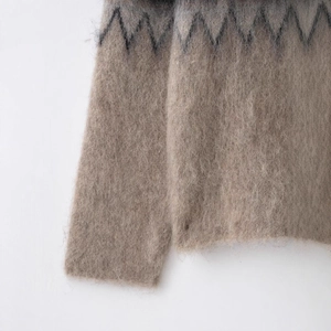 Taupe and black jacquard knit sweater featuring fuzzy mohair texture and geometric patterns