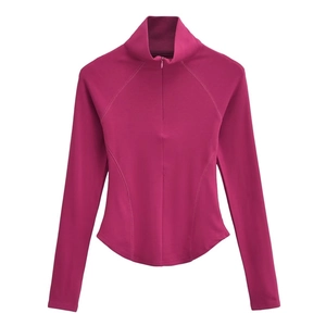 Haut de yoga ajusté magenta avec demi-zip col montant et ourlet incurvé pour femme
