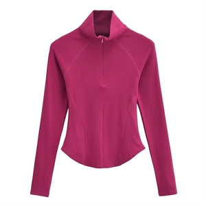Haut de sport ajusté à manches longues rose baie avec demi-zip et ourlet arrondi