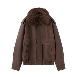 Detail of dark brown faux suede bomber jacket featuring a fluffy faux fur collar and pockets