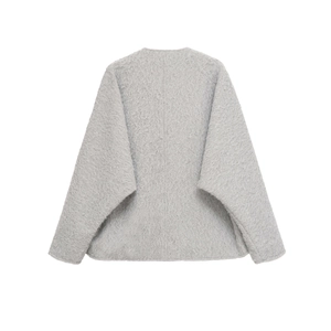 Macro shot of light gray faux wool fabric texture on long sleeve fashion jacket