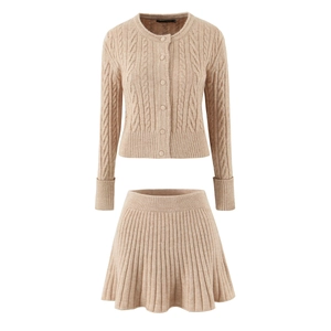 Two-piece oatmeal knit set featuring a cable-knit cardigan and pleated mini skirt
