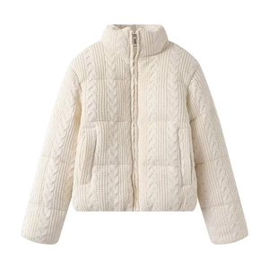 Detail of cable knit texture on cream stand collar quilted jacket for women