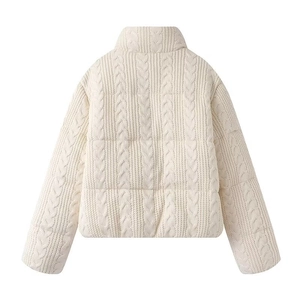 Back view of cream cable-knit padded jacket with stand collar and textured finish