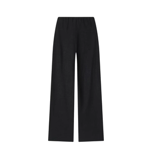 Détail à plat d'un pantalon noir à jambes larges avec taille haute élastiquée