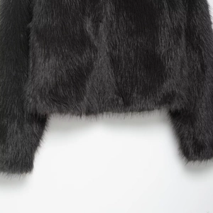 Chic black faux fur coat for women with a stand collar and elegant texture design