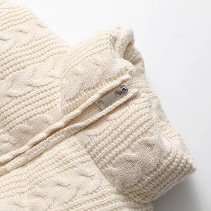 French style cream cable knit sweater jacket with silver metal zipper detail