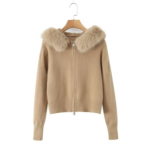 Close-up of khaki zip-up cardigan featuring a plush faux fur collar and ribbed knit texture