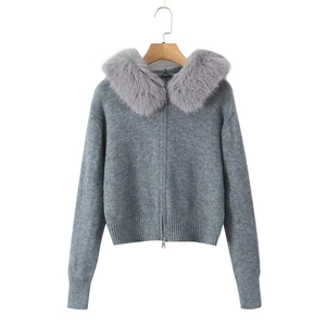 Detailed view of gray hooded cardigan with plush faux fur collar and zip-up front closure