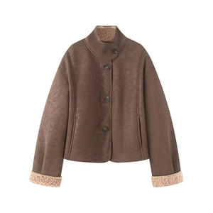 Detail of faux suede jacket with beige faux fur lining and stand collar in brown